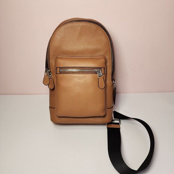 NWT COACH 2540 West Pack Sling Bag Backpack Refined Pebble Leather Light Saddle - Picture 1 of 6